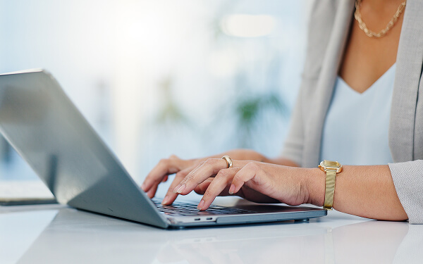 Woman preparing tax documents online